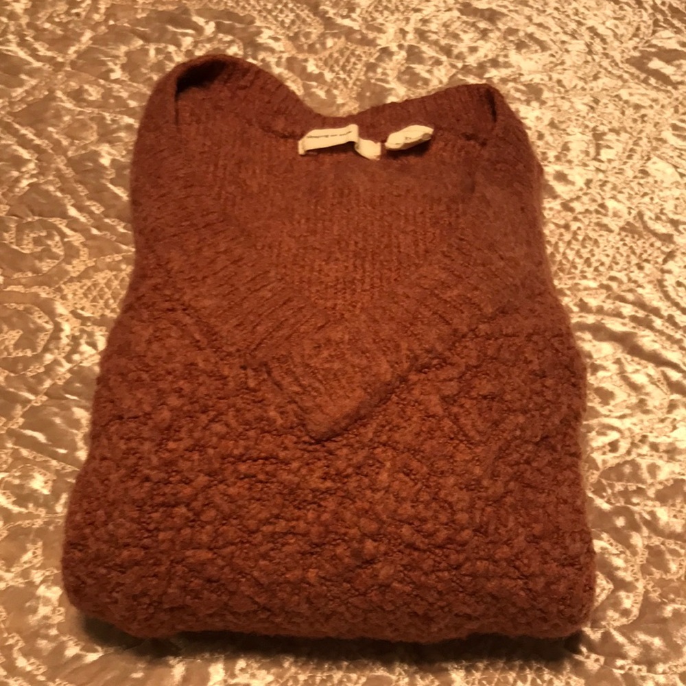 V-Neck Boucle Sweater in pink from Anthropologie